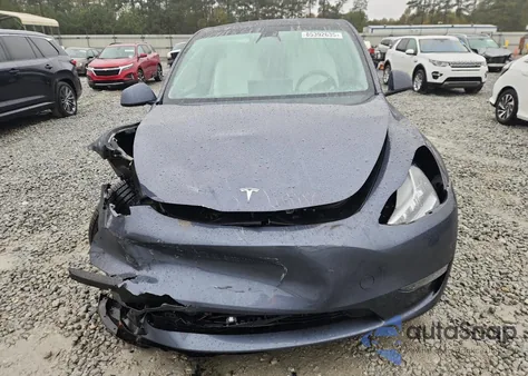 2023 Tesla Model Y from USA, damaged, VIN 7SAYGDEE6PA116003